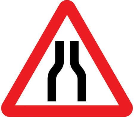 Road narrows on both sides